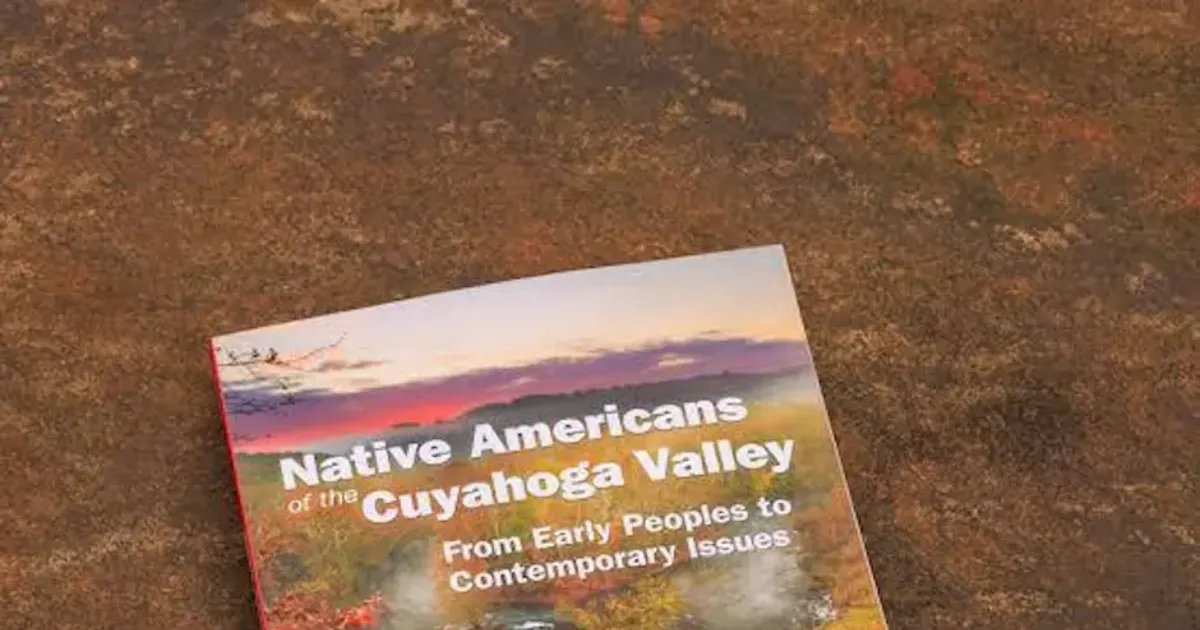 Copy of the book “Native Americans of the Cuyahoga Valley: From Early Peoples to Contemporary Issues” displayed on a table.